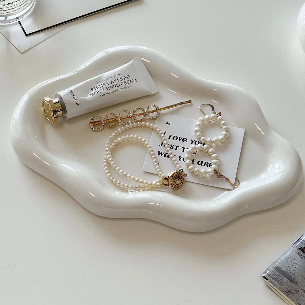 Ceramic cloud tray in white ceramic with a smooth glossy finish and organic wavy edges