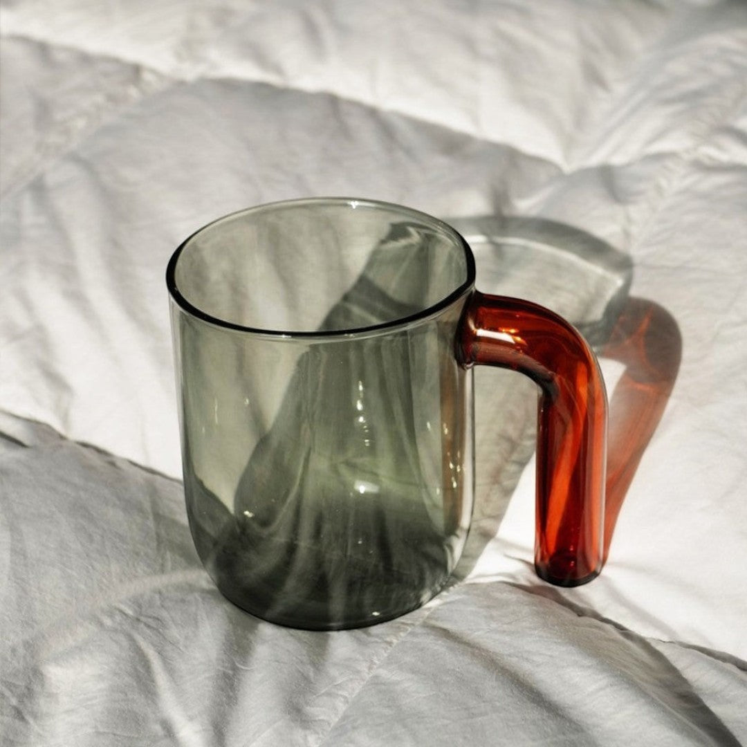 HOMELIVY Color Block Retro Glass Mug with a smoky grey body and a striking amber handle, perfect for coffee or tea.