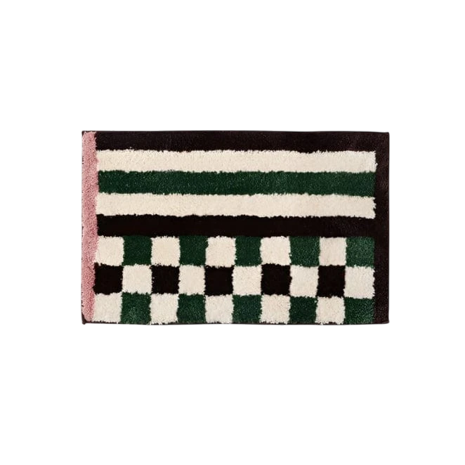 Retro checkered plaid rectangular bath mat with plush textured dark green cream stripes and a pink border edge