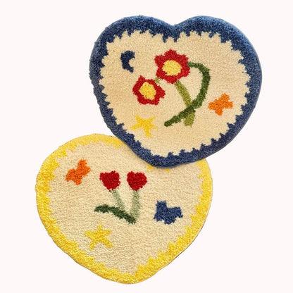 Heart-shaped rug with floral design on a textured surface