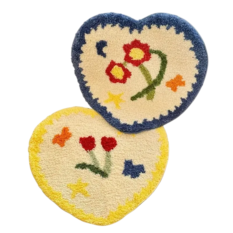 Heart-shaped rug with floral design on a textured surface