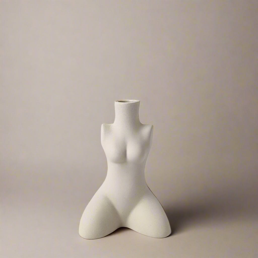White ceramic body shaped vase featuring a stylized female torso design for decorative use