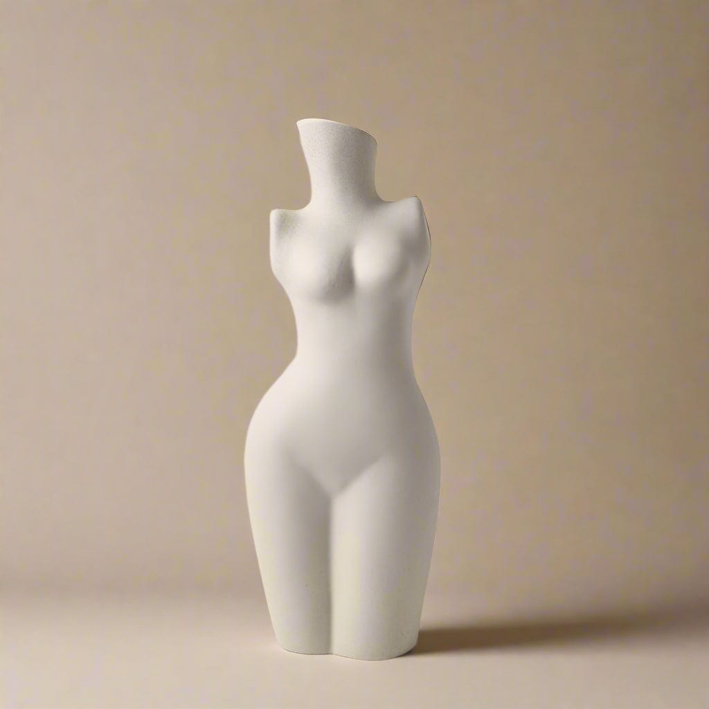 White ceramic body shaped vase resembling a stylized female figure for decorative use