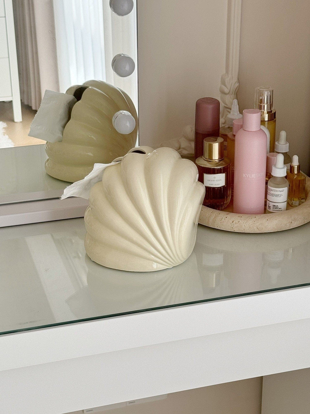 Cream-colored ceramic tissue box shaped like a seashell for decorative tissue storage shell tissue holder
