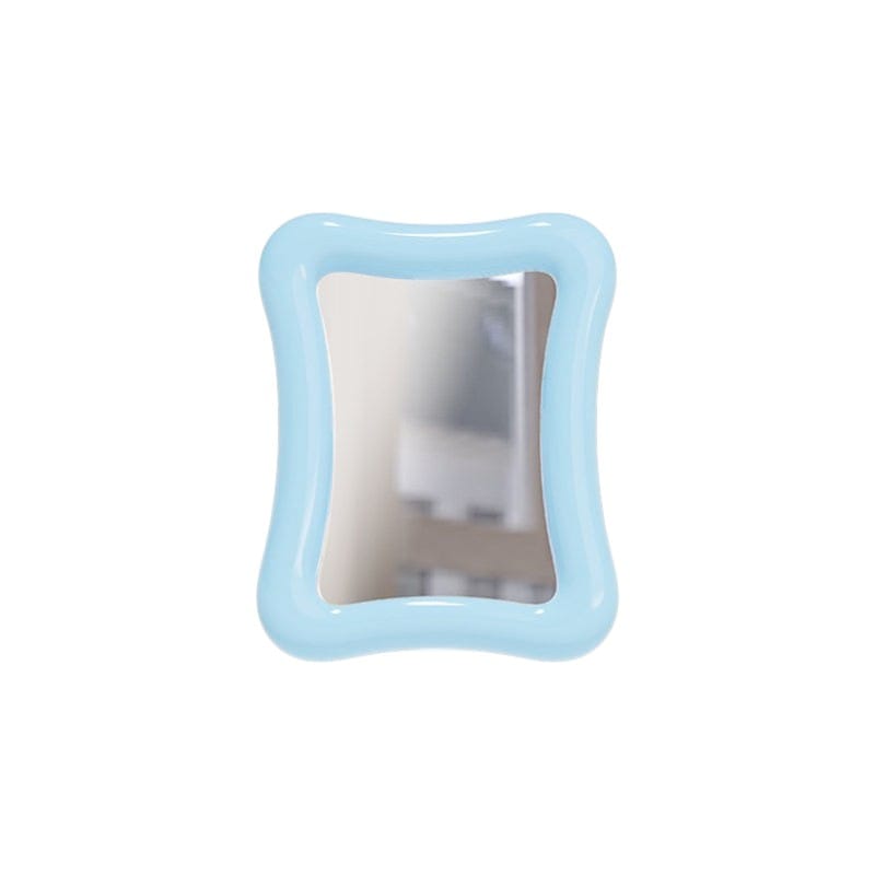 HOMELIVY light blue wavy desk mirror with a glossy finish and clear reflective surface.