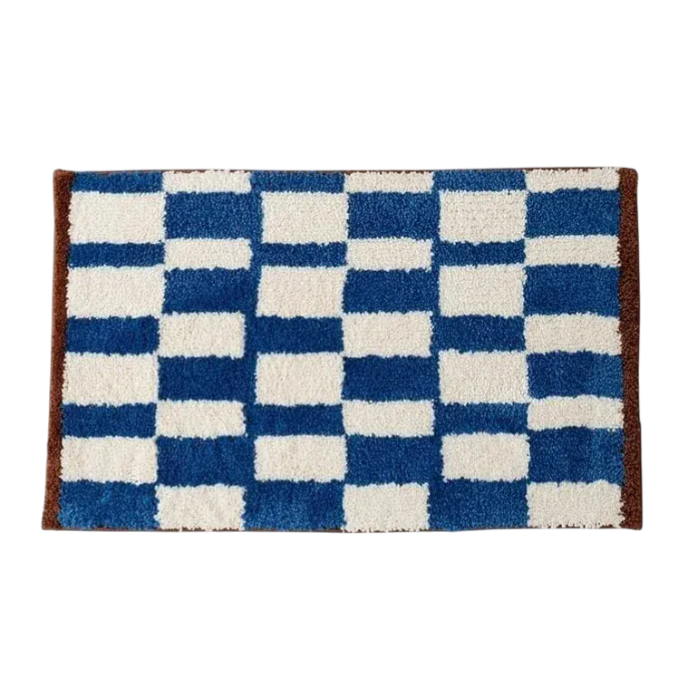 HOMELIVY blue and white checkered shag rug with brown trim. Retro checkerboard design.