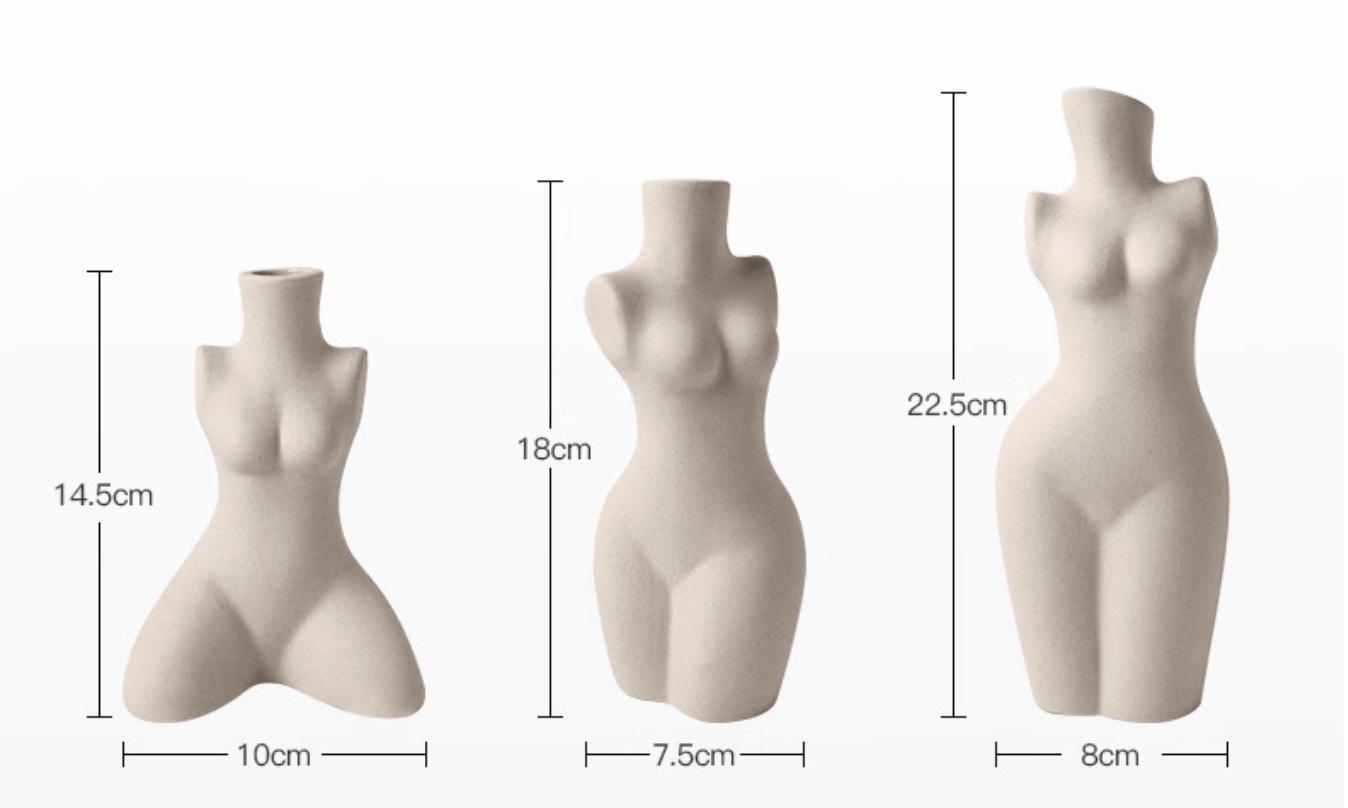 Three beige ceramic body shaped vases in varying heights and widths showcasing female torso designs