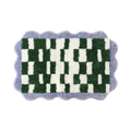 Soft wavy checkered retro bath mat with green and cream white pattern
