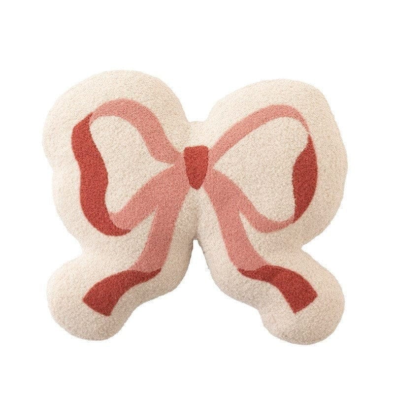 HOMELIVY cream textured pillow with a pink ribbon bow design. Playful accent cushion for decor.