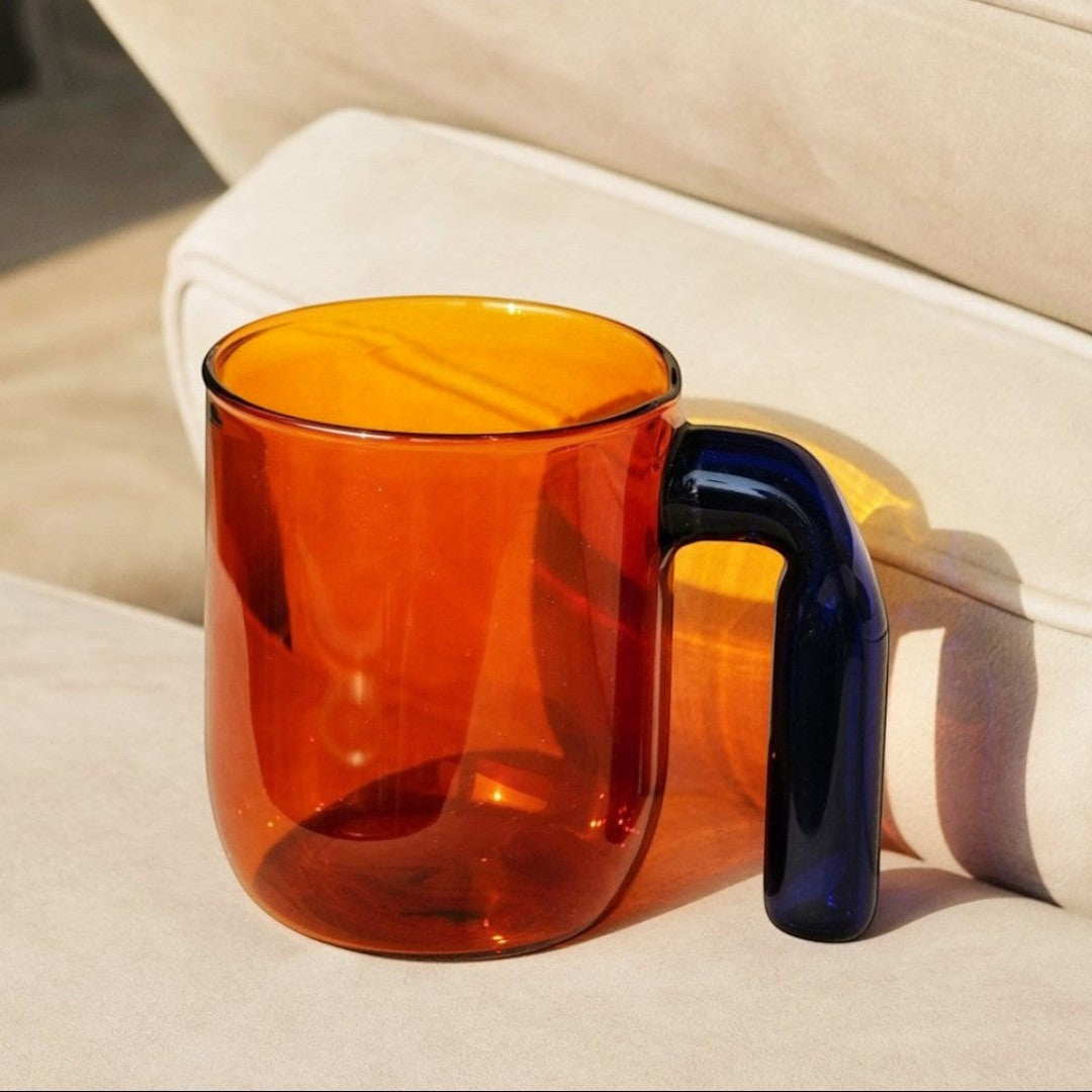 HOMELIVY Color Block Retro Glass Mug in amber with a contrasting dark blue handle, perfect for coffee or tea.