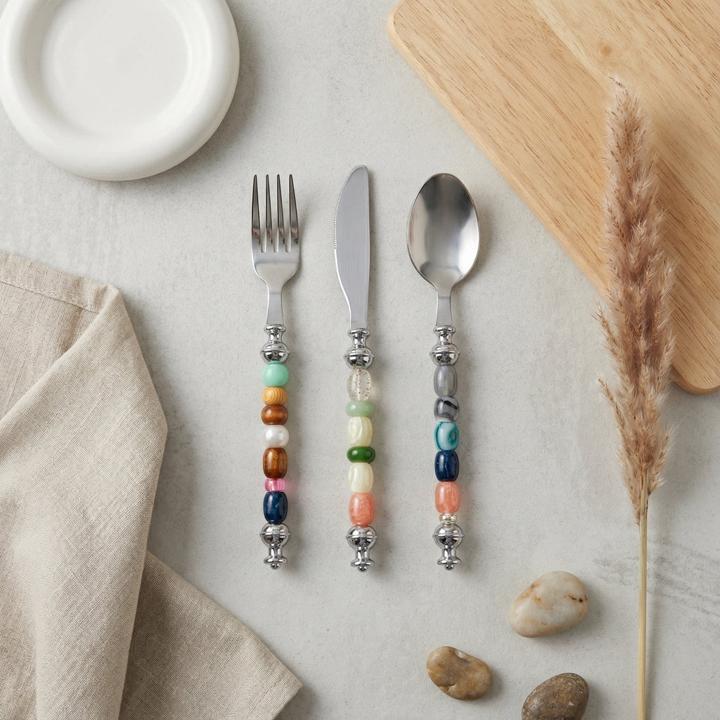 HOMELIVY beaded cutlery set featuring a fork, knife, and spoon with colorful decorative beads on stainless steel