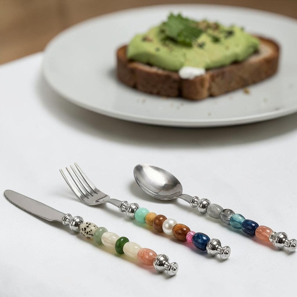 HOMELIVY beaded cutlery set featuring a knife, fork, and spoon with colorful decorative stone and pearl handles.