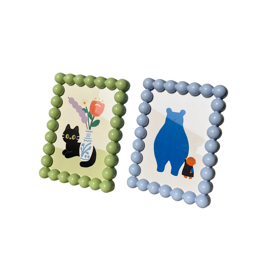 HOMELIVY pastel green and blue resin picture frames with raised bead borders, featuring cute animal art.
