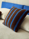 Blue and chocolate brown boucle throw pillow