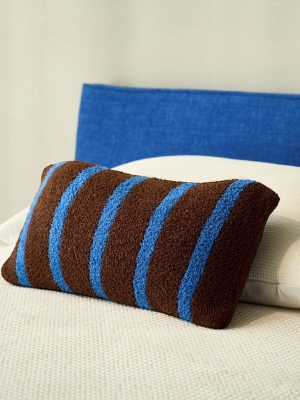 Bold stripe lumbar pillow in chocolate brown and blue boucle fabric