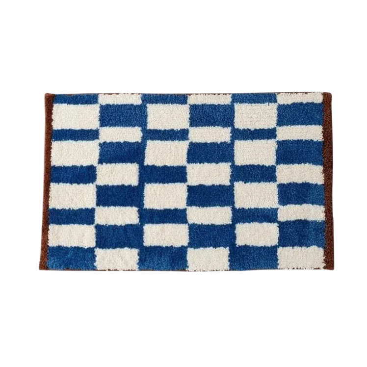 HOMELIVY retro blue and white checkered bath mat with brown trim. Soft shag texture.