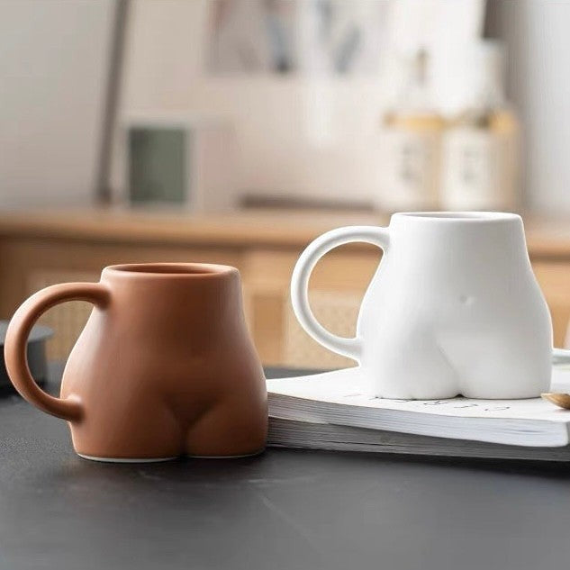 HOMELIVY Booty Mug set in white and terracotta ceramic, featuring a cheeky butt-shaped design for coffee or tea.