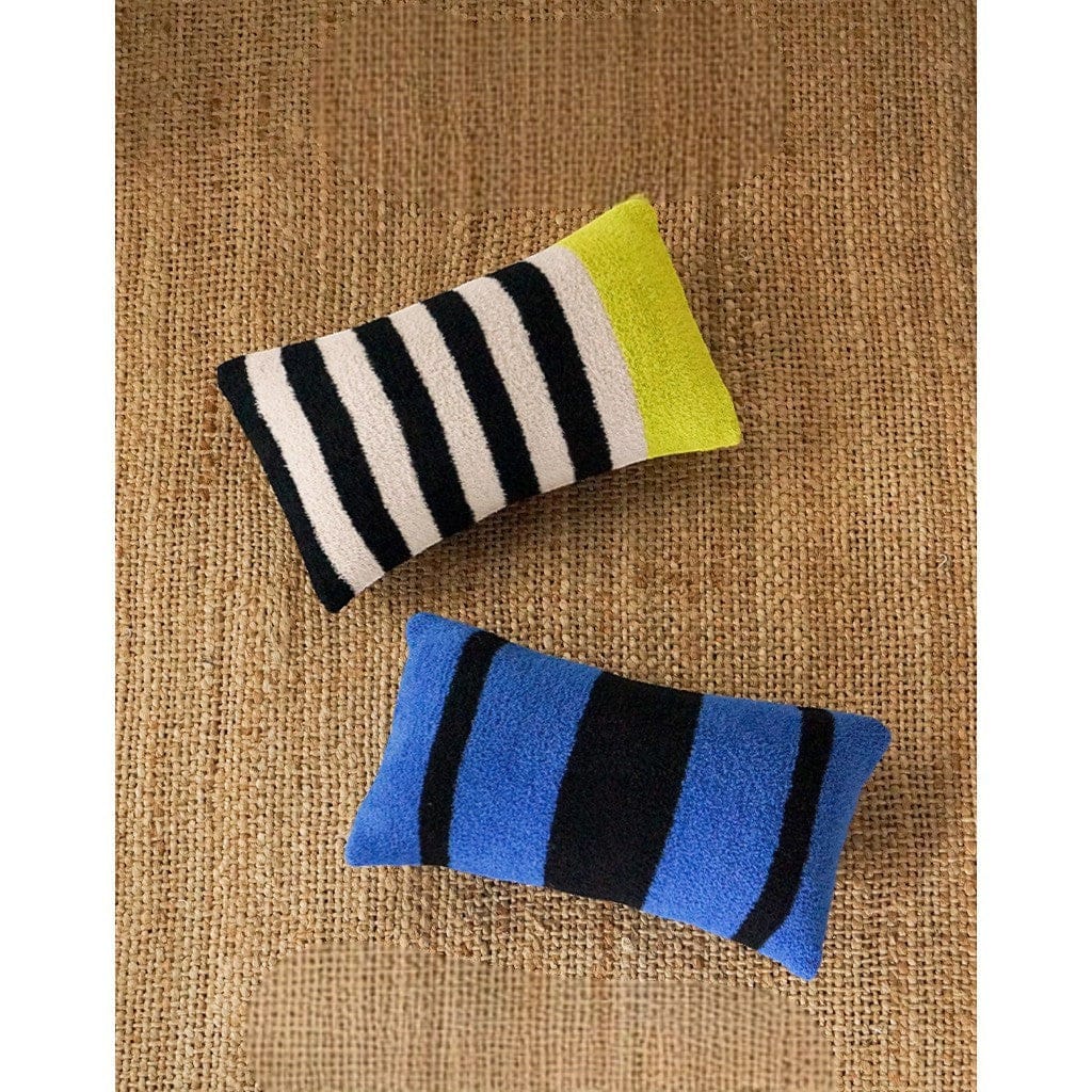 HOMELIVY striped lumbar pillow in black, cream, and lime green bouclé fabric. Rectangular shape.