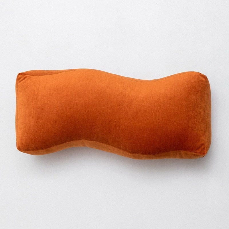 HOMELIVY burnt orange sculptural velvet bolster cushion with a soft suede-like finish.