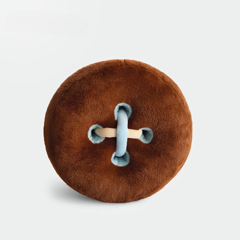 HOMELIVY brown plush button cushion with light blue and tan stitching detail