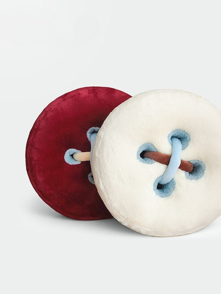 HOMELIVY two button plush cushions, one red and one cream, with blue and brown stitching detail.