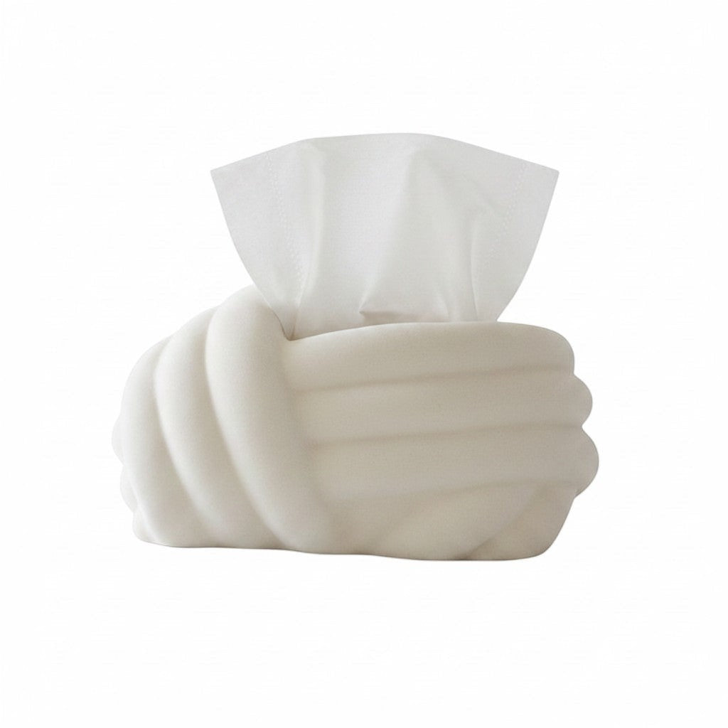 HOMELIVY cream white ceramic tissue box cover with sculptural knot design. A hand is shown pulling a tissue.