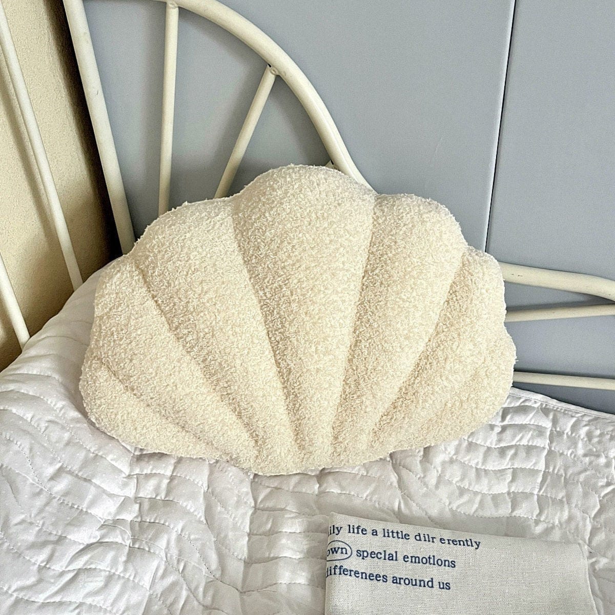 HOMELIVY cream bouclé shell shaped throw pillow, 35 x 25 cm, coastal decor accent.