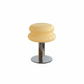 HOMELIVY creamy yellow glass bedside table lamp with chrome base, 21cm height, 15cm width.