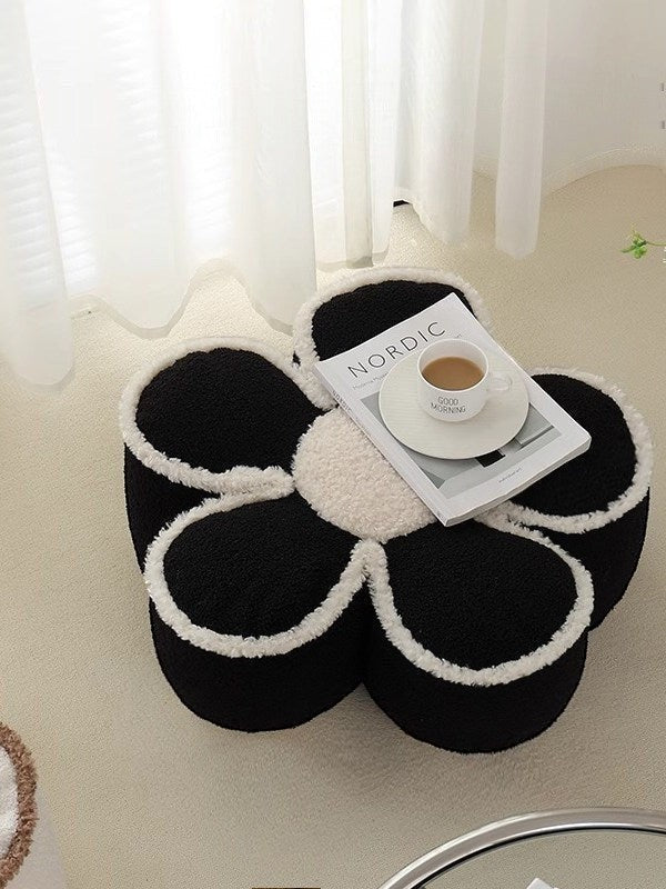 HOMELIVY black and white daisy flower shaped sherpa pouf pillow used as a decorative floor seat or coffee table