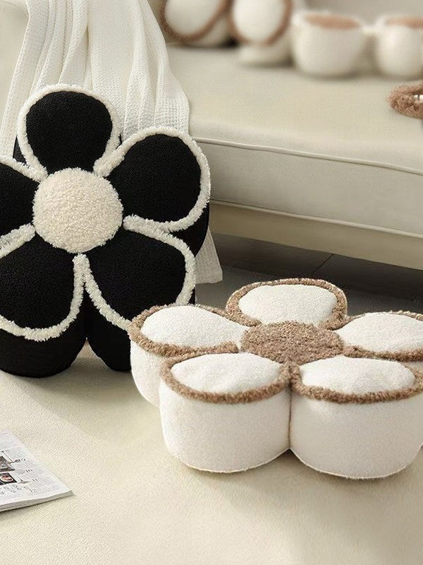 HOMELIVY daisy flower shaped pouf pillows in black and white textured fabric for cozy living room floor seating.