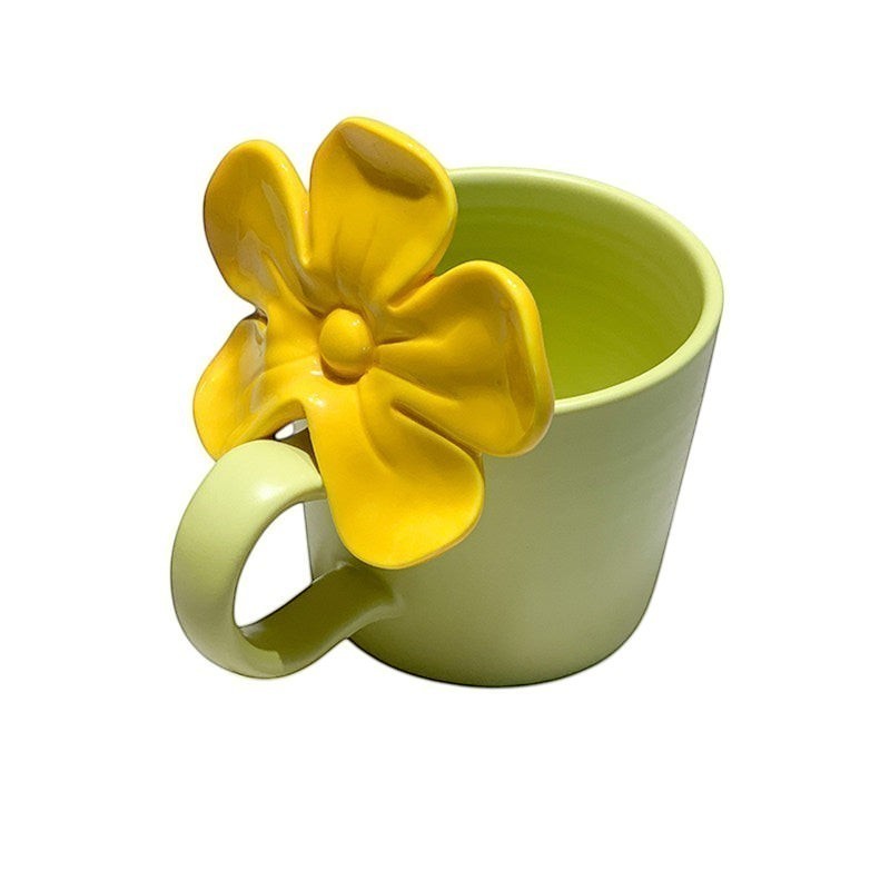 Mint green coffee mug with  3D yellow handle