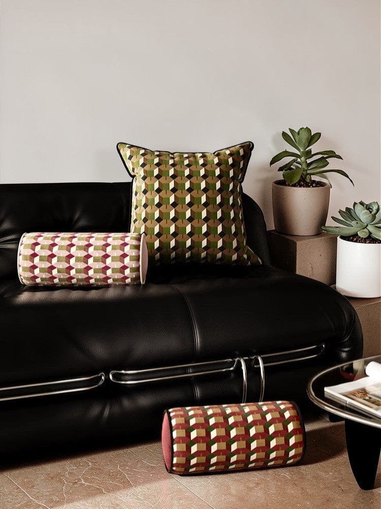 HOMELIVY geometric print bolster cushion in green, brown, and cream, and a matching square cushion.
