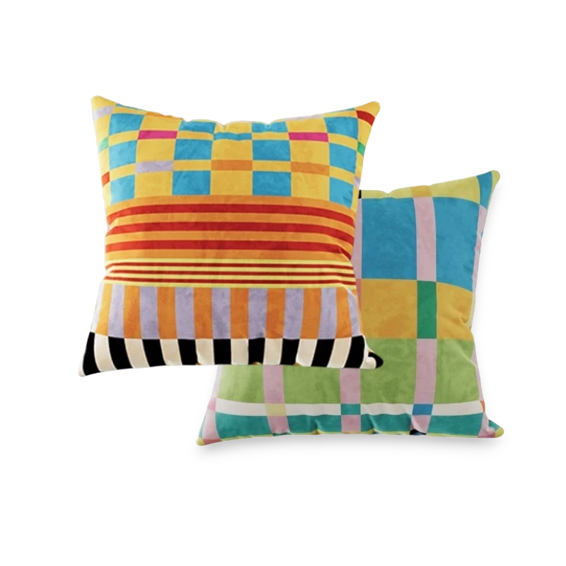 HOMELIVY maximalist throw pillow featuring a vibrant mix of colorful checkered and striped patterns in velvet.