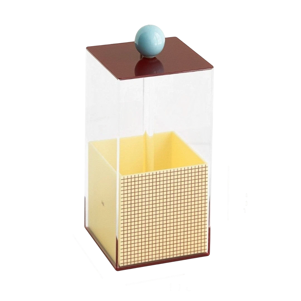 HOMELIVY Quirky Memphis acrylic brush holder with geometric grid pattern, yellow interior, and light blue knob on maroon lid.
