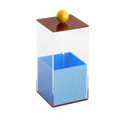 HOMELIVY Quirky Memphis acrylic brush holder with blue, red, and yellow accents. Geometric design with a yellow sphere on top.