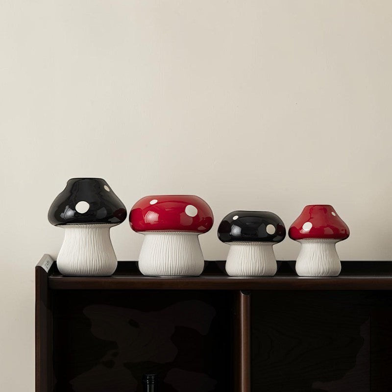 HOMELIVY ceramic mushroom vases in red and black with white polka dots and textured stems on a wooden shelf.