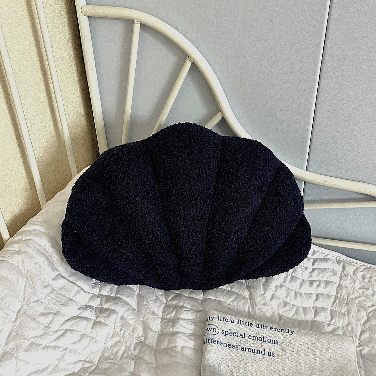 HOMELIVY navy blue bouclé shell-shaped throw pillow, 35 x 25 cm, coastal decor accent.