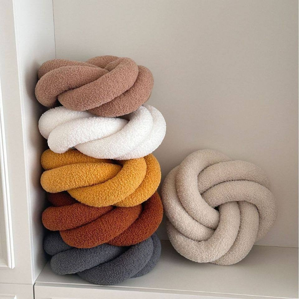 HOMELIVY Nordic knot cushion pillow in boucle fabric, available in brown, white, mustard, rust, grey, and beige.