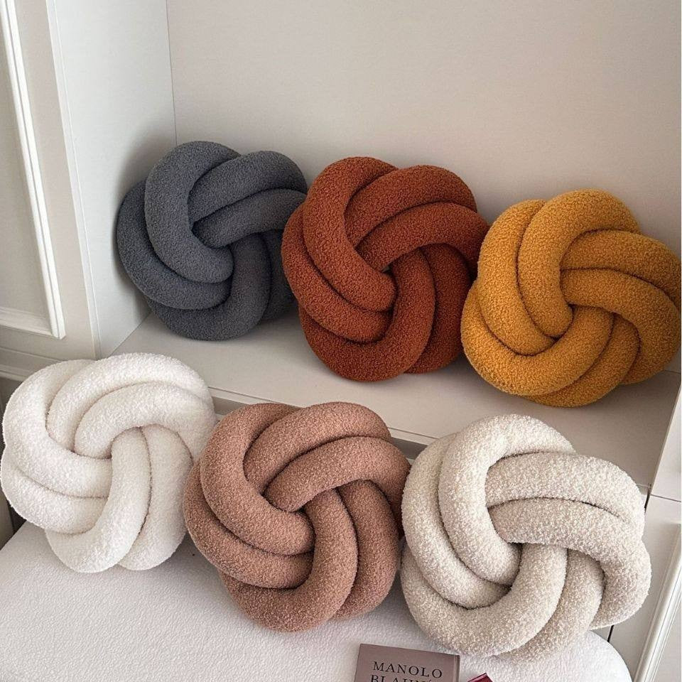 HOMELIVY Nordic knot cushion pillow in boucle fabric, available in grey, rust, mustard, white, and blush pink.