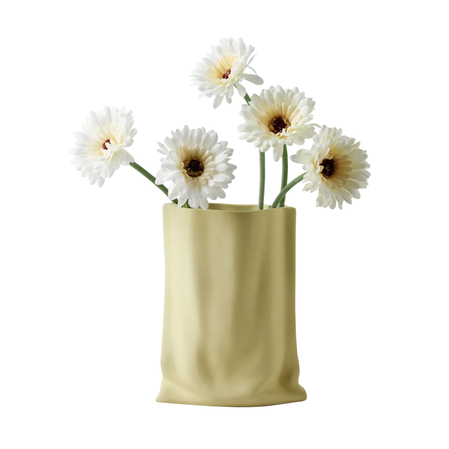 HOMELIVY paper bag style ceramic vase in pale yellow holding a bouquet of white gerbera daisies on black background