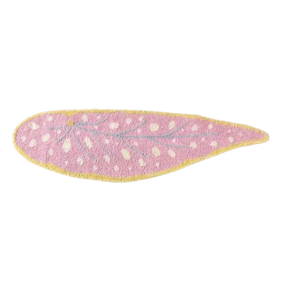 Pink leaf shaped rug with textured surface pink color yellow border and white polka dots for home decor