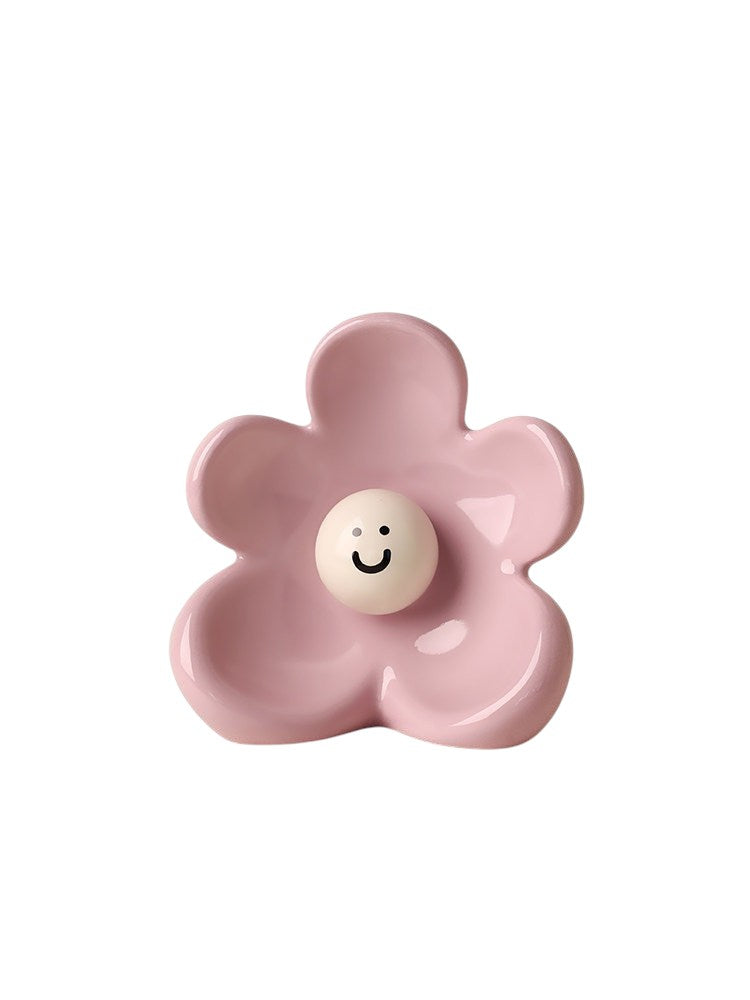 HOMELIVY pink ceramic flower-shaped vase with a cute white smiley face center for home decor.