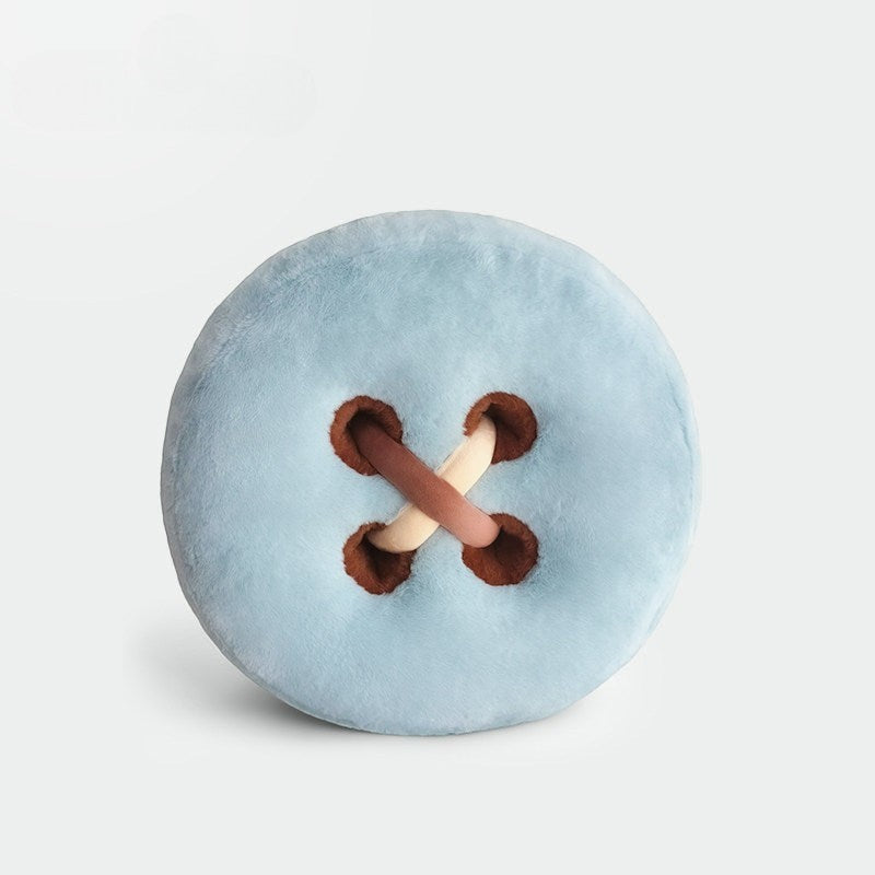 HOMELIVY light blue plush button cushion with brown stitching and tan accent