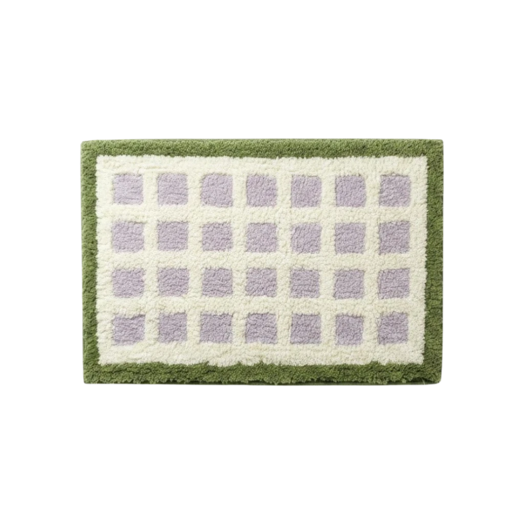 HOMELIVY rectangular bath mat featuring a purple and cream checkered pattern with a textured olive green border.