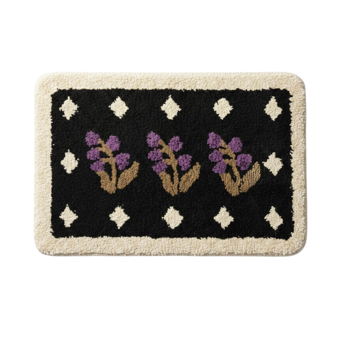 HOMELIVY purple floral bath mat with cream trim and diamond pattern on black background