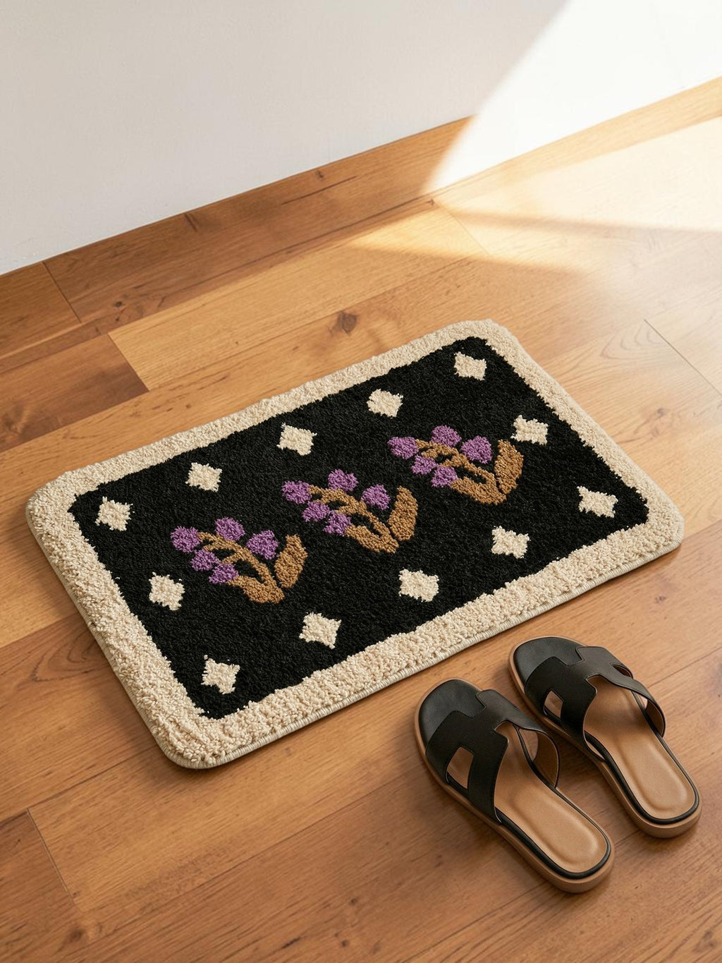 HOMELIVY black bath mat with purple floral embroidery and beige trim. Features a vintage floral design.