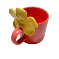 Red coffee mug with  3D yellow handle