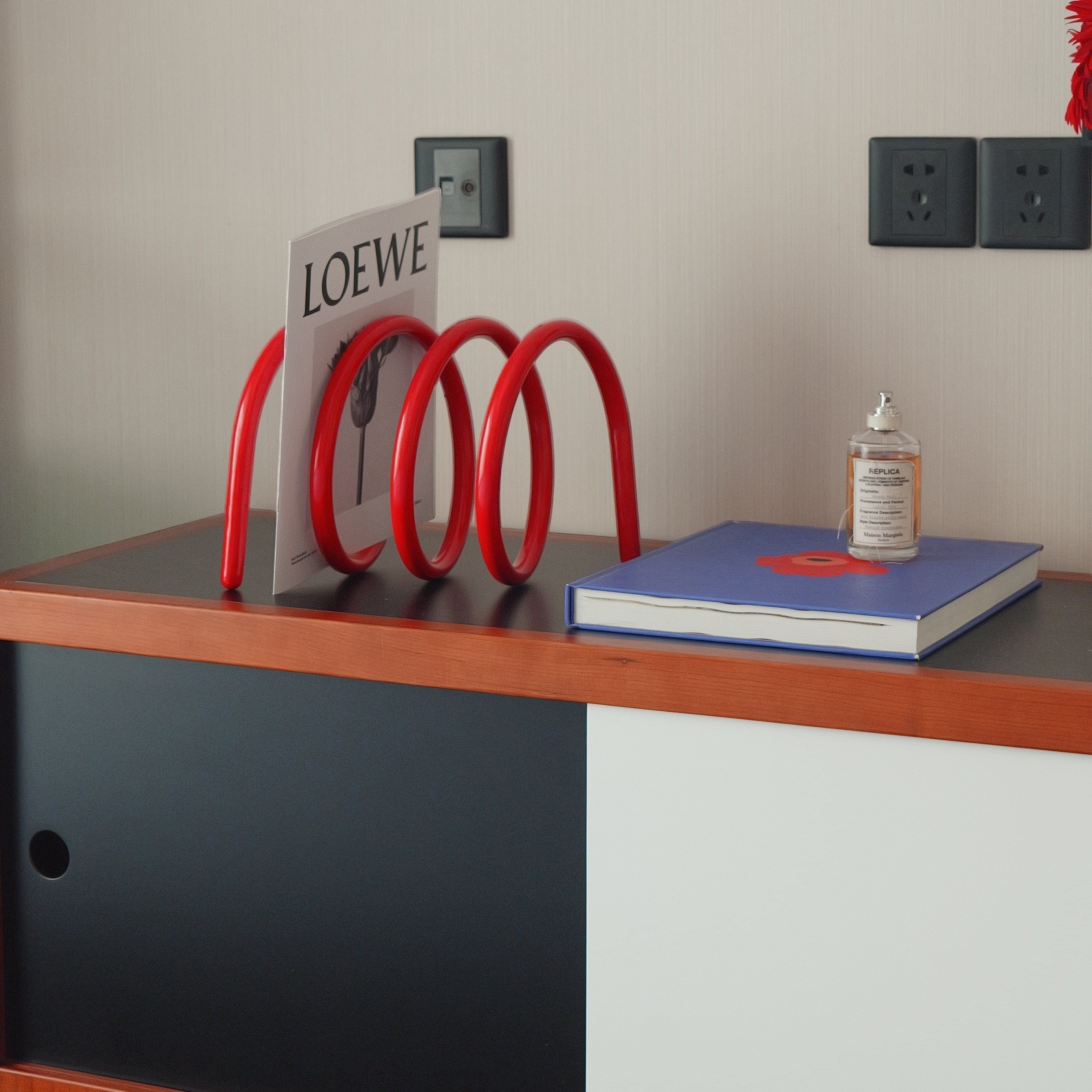 Red spiral spring amazgine book holder for retro mordern homes