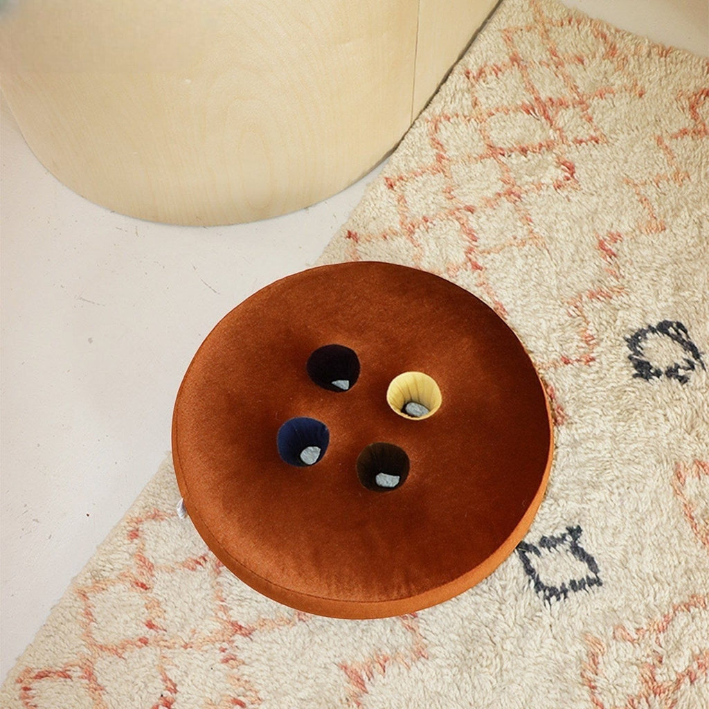 HOMELIVY round velvet seat cushion in rust orange with four colorful button inserts: navy, black, yellow, and grey.