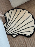 HOMELIVY funky rugs - cream shell-shaped rug with black trim and stripes,